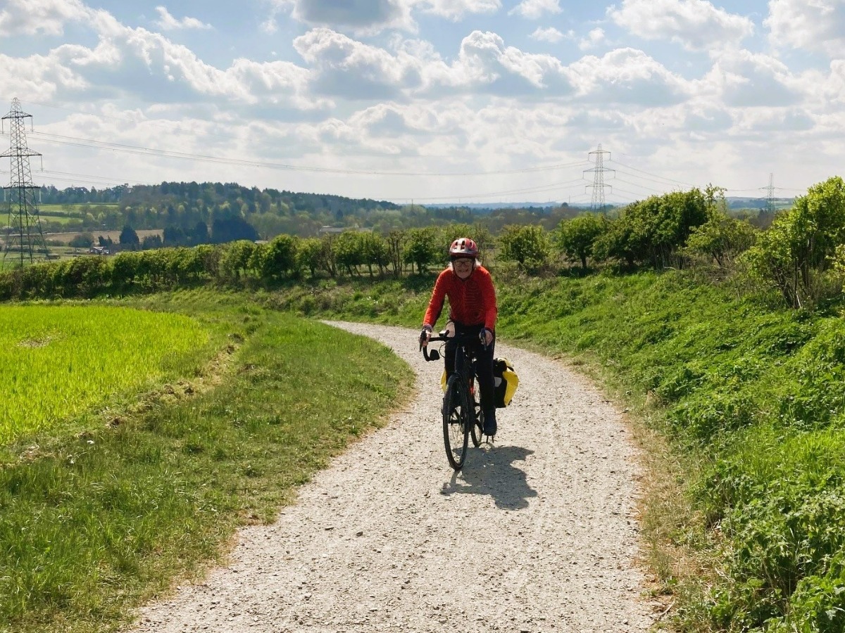 Norman Foster cycles the Sally Woods Lane pathway in Creeting St Mary following Mid Suffolk CIL-funded improvements